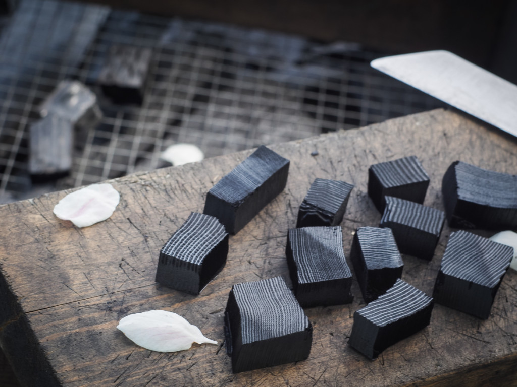 chopping charcoal (sumi-kiri) made from old growth fir scraps